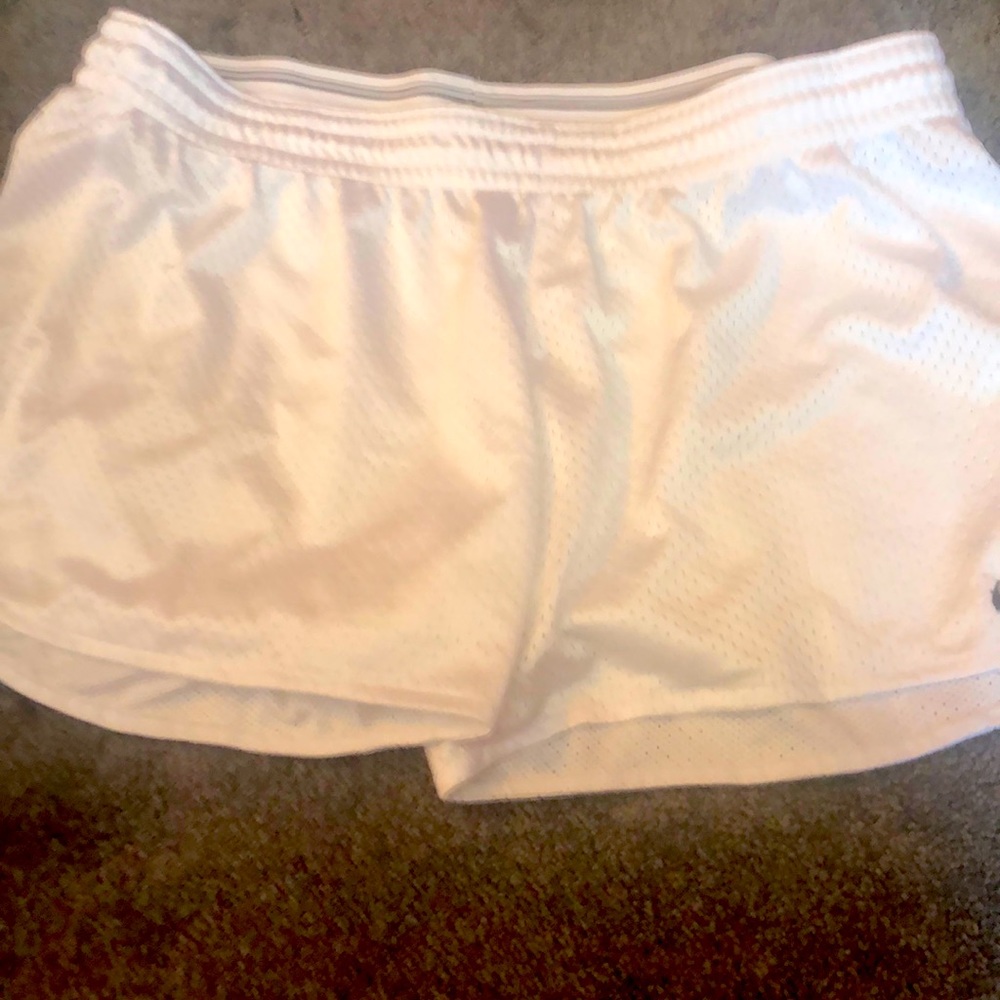 White Nike shorts